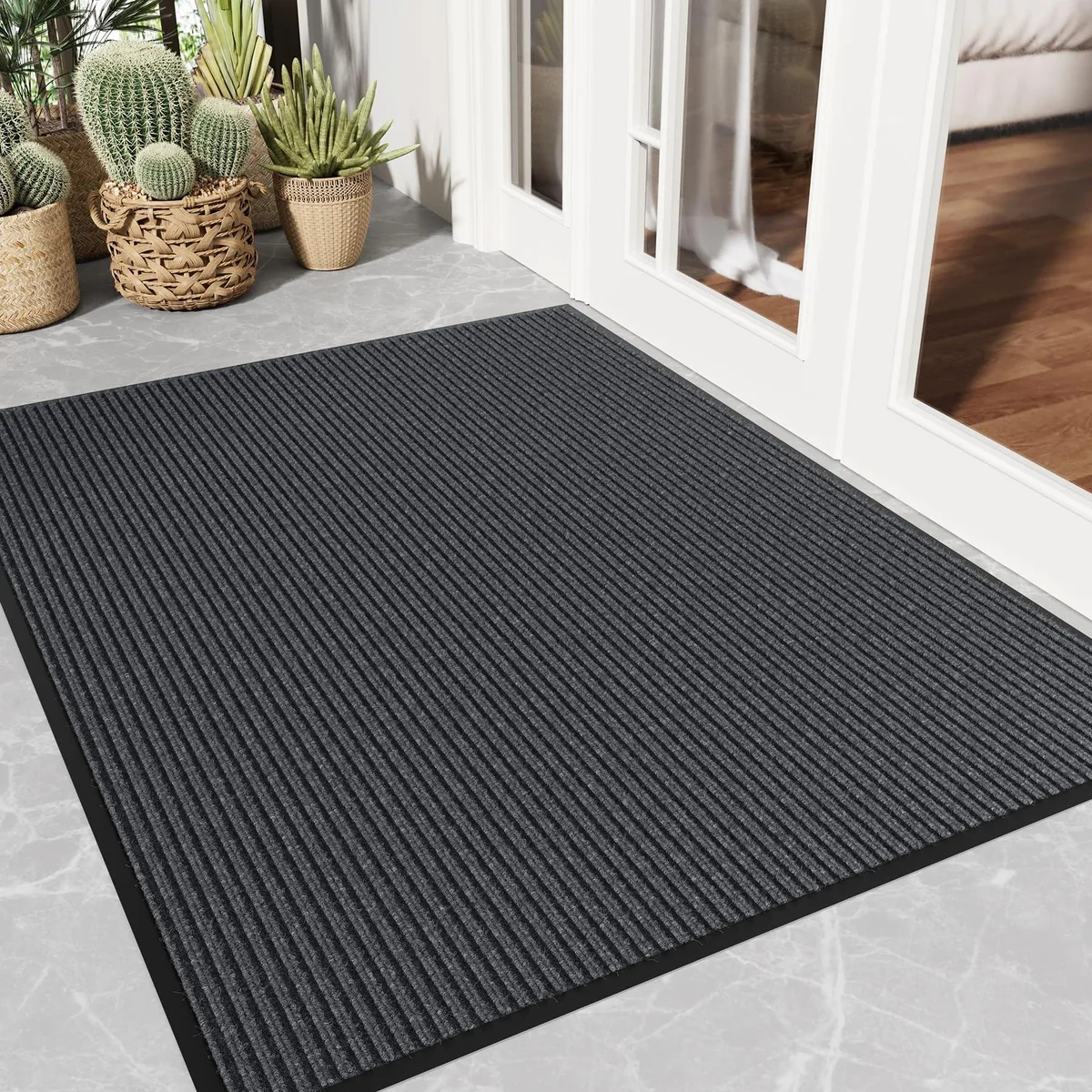 Grey striped rectangular door mat with low-profile textured surface and PVC backing