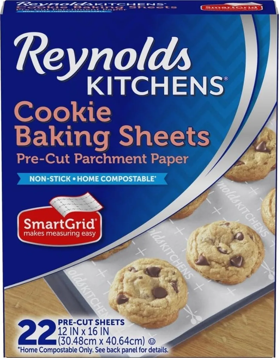 Box containing 22 pre-cut white parchment sheets 12 by 16 inches