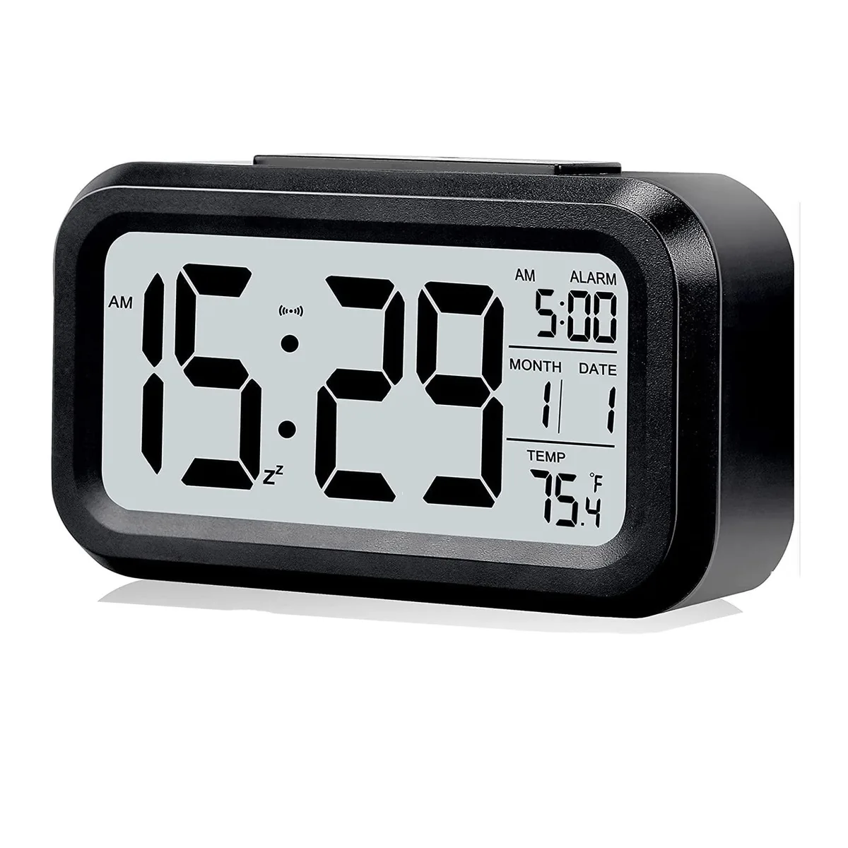 White rectangular LCD alarm clock on tabletop, shows time date temperature, light sensor backlight night light, battery powered