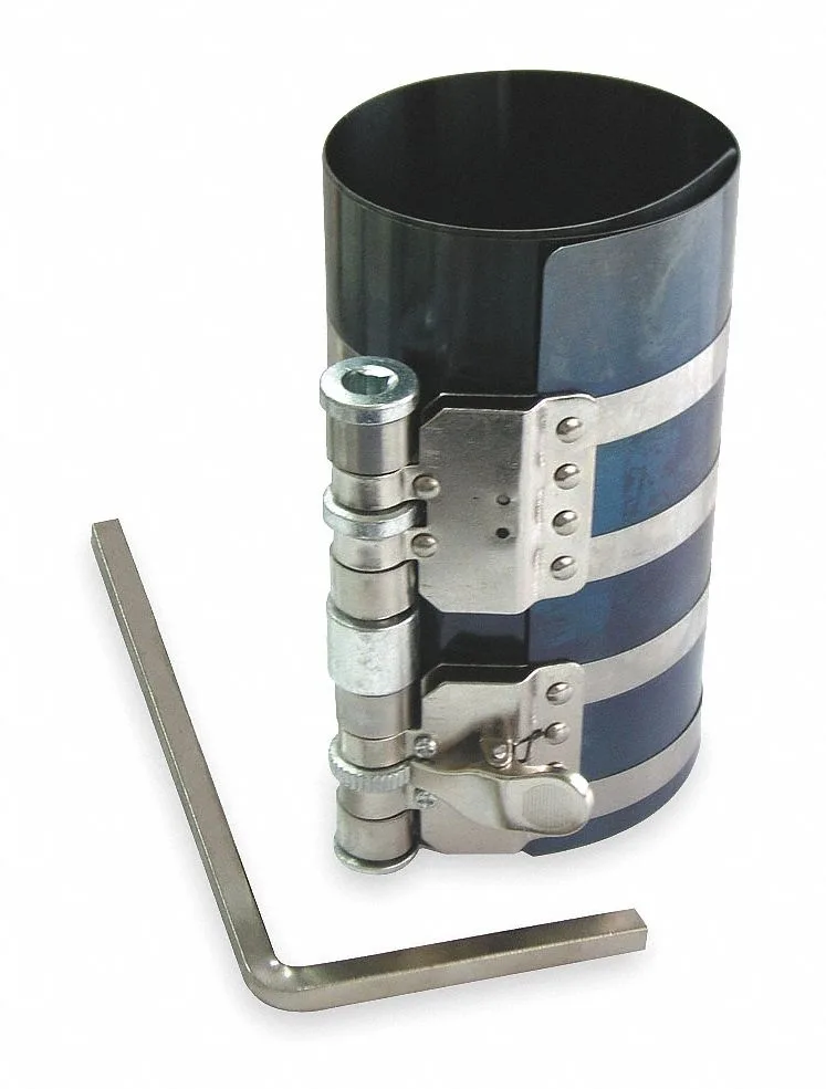 Westward diesel piston ring compressor with spring steel bands and square handle