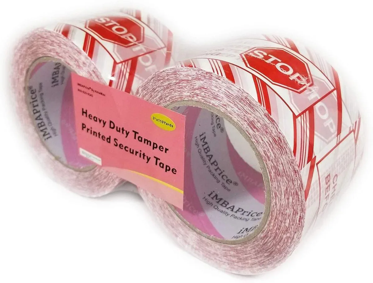 Two rolls of white security tape with red lettering