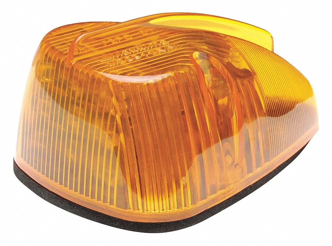 Amber triangular LED clearance light with polycarbonate lens and grommet mount