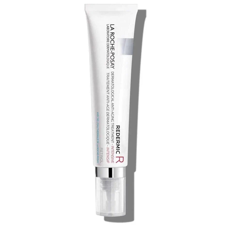 White 30ml tube with flip cap on light surface