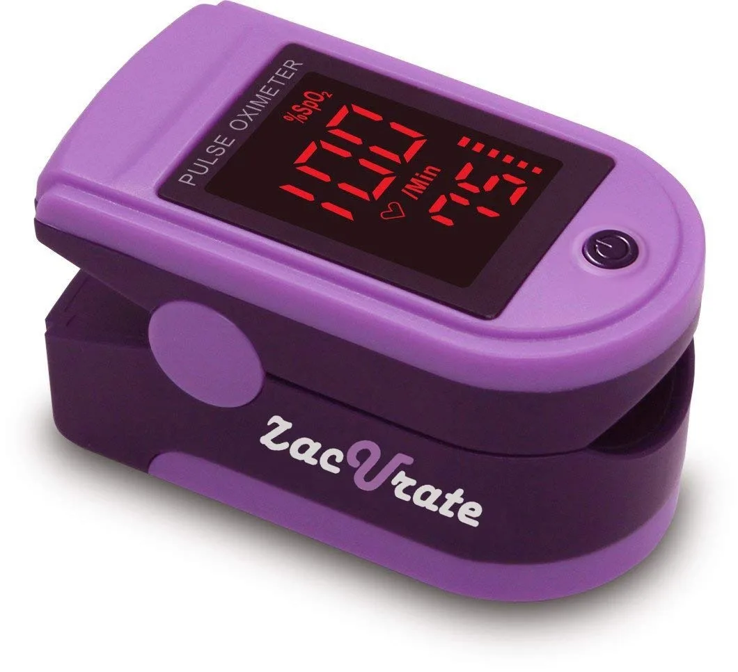 Small white fingertip pulse oximeter with clear silicone cover and lanyard attached