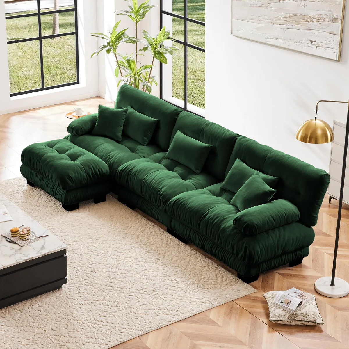 Green chenille modular L‑shaped sectional with deep cushions, rounded bolster armrests and a convertible ottoman