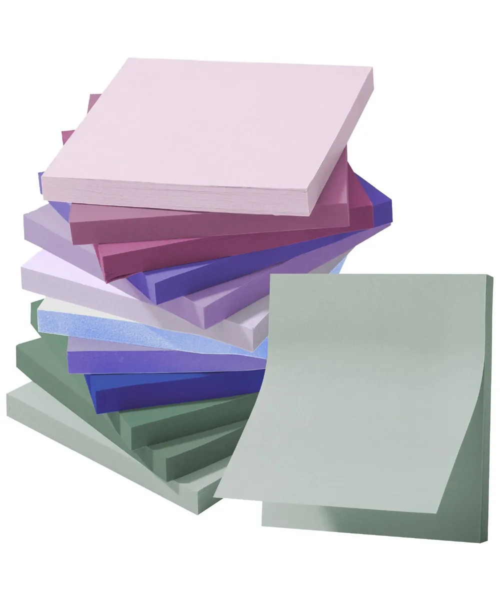 A stack of twelve square sticky-note pads in muted colours, each pad 3 by 3 inches