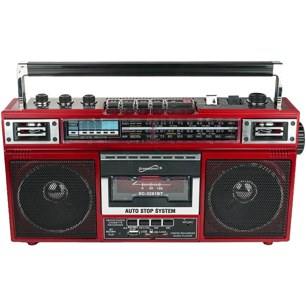 Red retro radio cassette player with analog dials and carry handle