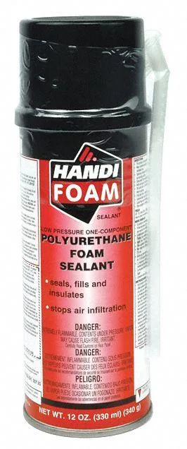 Twelve cream aerosol cans of spray foam sealant in a pack