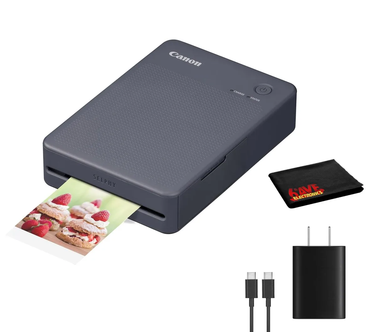Dark gray Canon SELPHY QX20 printer with USB-C cable, adapter and cleaning cloth