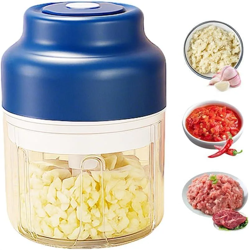 Blue wireless mini food processor, compact cup with blade assembly, USB charging port visible