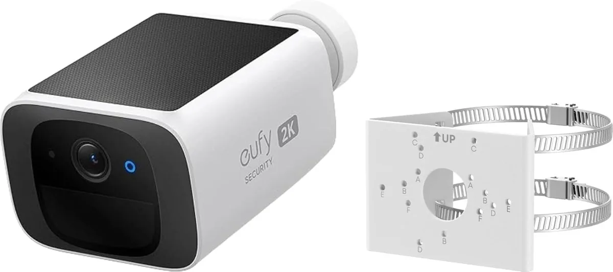 White wireless camera with solar panel and metal pole mount bracket