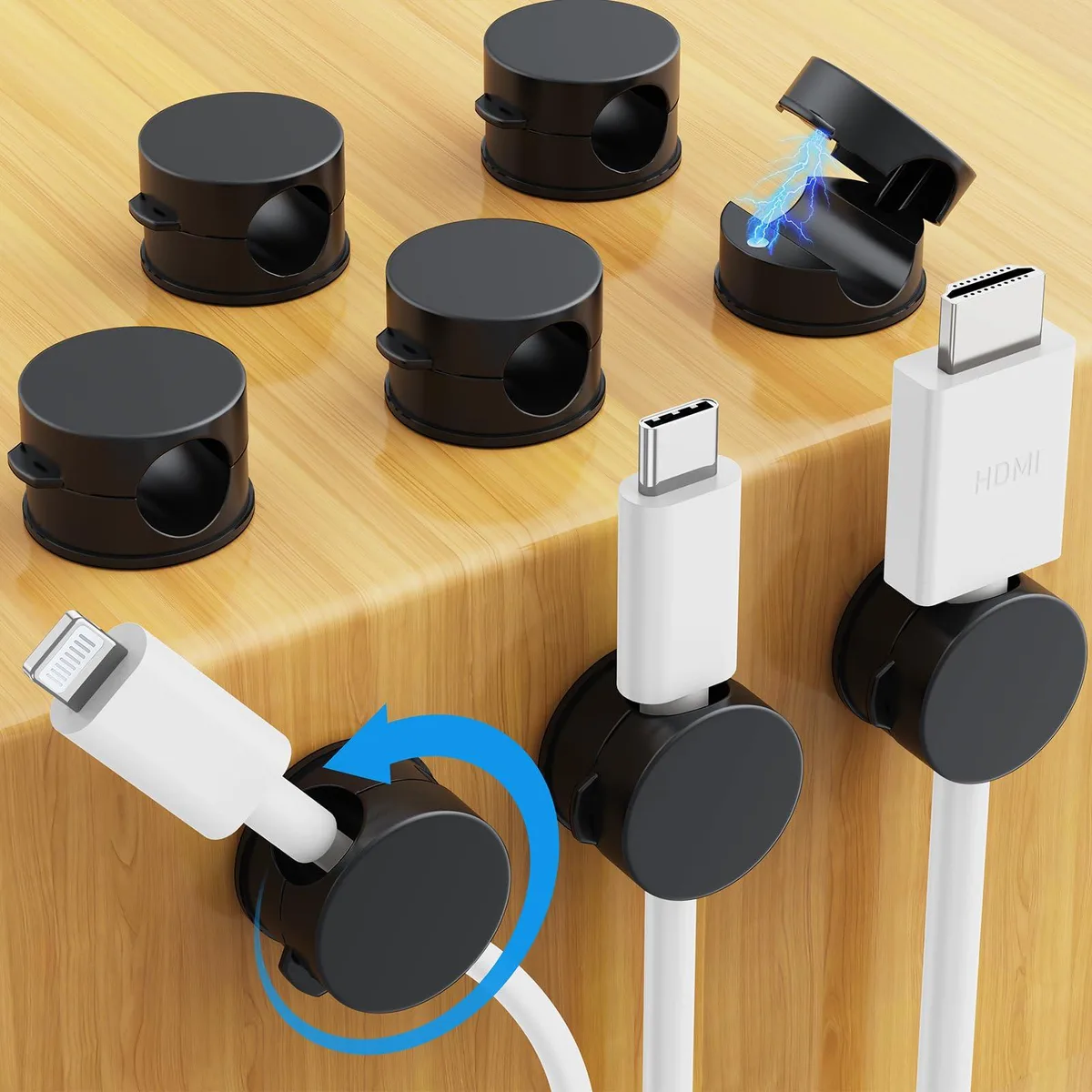 Eight black magnetic cable clips with rotating bases and adhesive pads