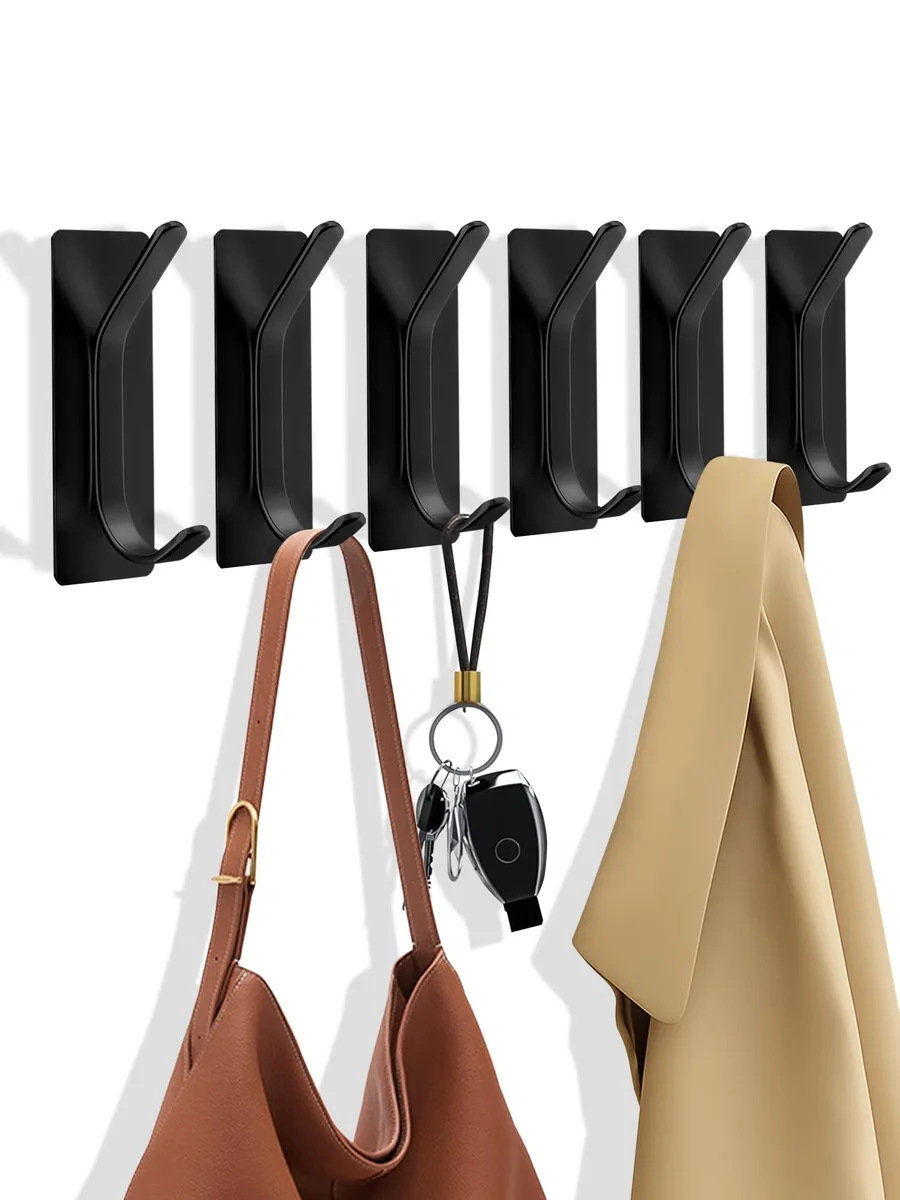 Six black metal double hooks with adhesive backing, twelve pieces total