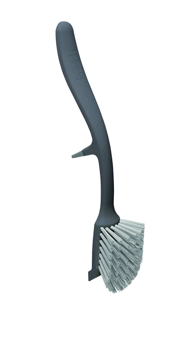 Grey dish brush with integrated sink rest and scraper
