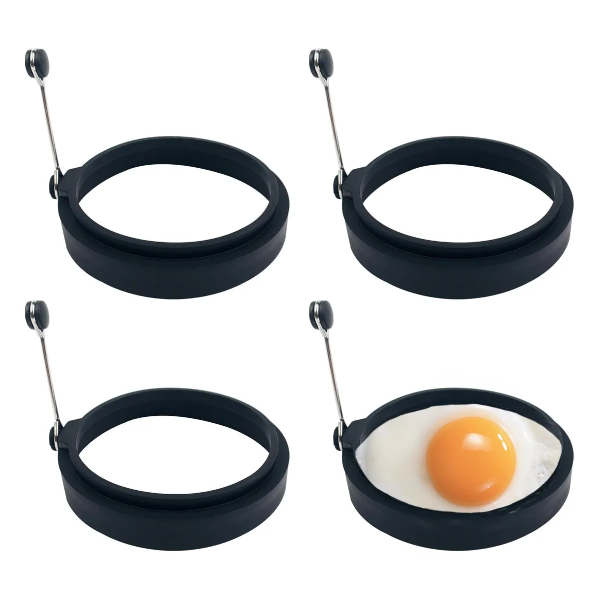 Four black silicone egg rings, 10cm diameter, heat resistant to 230°C