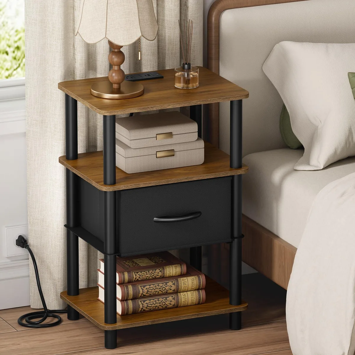 Three-tier bedside table rustic brown top black frame fabric drawer visible charging ports