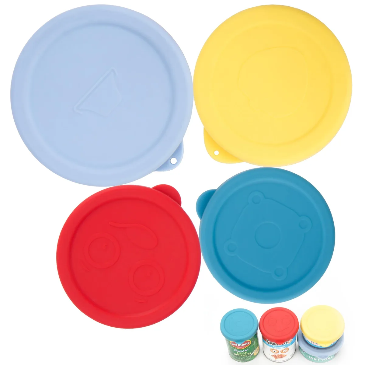 Four round silicone can lids in vibrant colours, sizes 3.0 to 4.0 inches