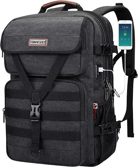 Black canvas travel backpack with leather handle, top zip and front flap pockets