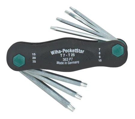 Seven white Torx flag-handle keys in a set