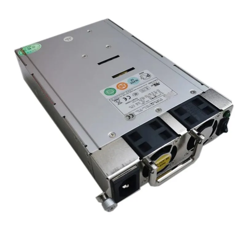 Rectangular black ATX power supply unit with ventilation grille and power socket visible