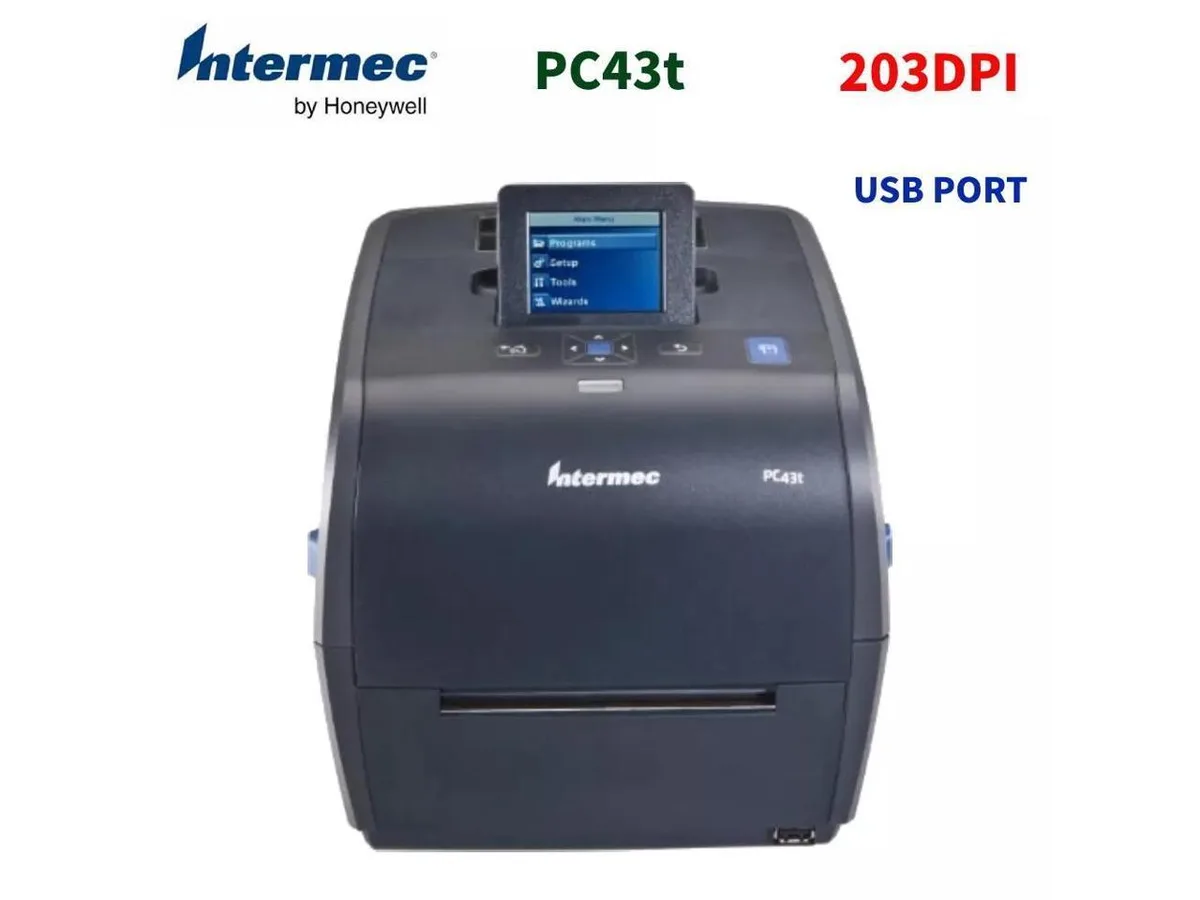 Intermec PC43T desktop label printer, matte grey plastic housing, front LCD panel, top media cover open showing roll spindle