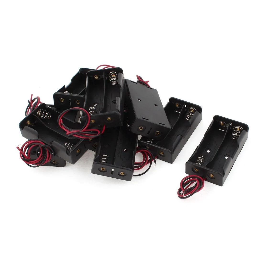 Nine black plastic AA battery holders with wires, each holding two cells side by side