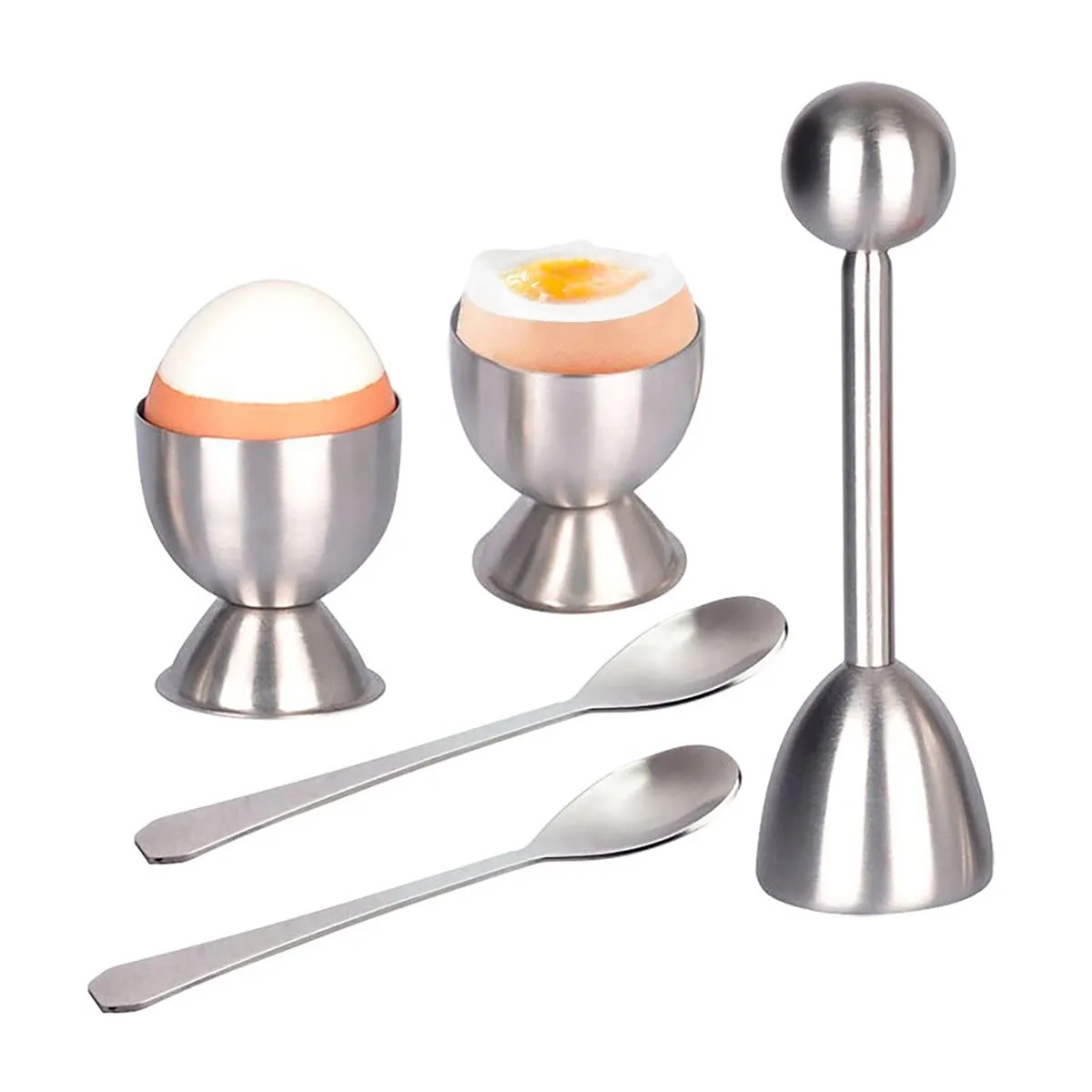 A stainless steel egg cracker set with topper, two spoons and two cups on a plain background