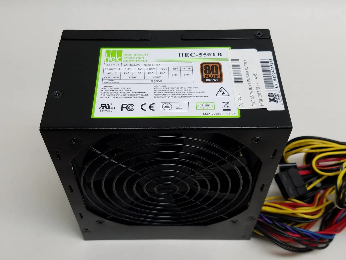 Rectangular black metal ATX power supply unit with 20+4 pin connector visible