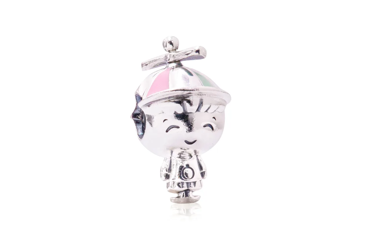 Sterling silver boy charm with rotating propeller cap in pastel enamel and Pandora crown O monogram