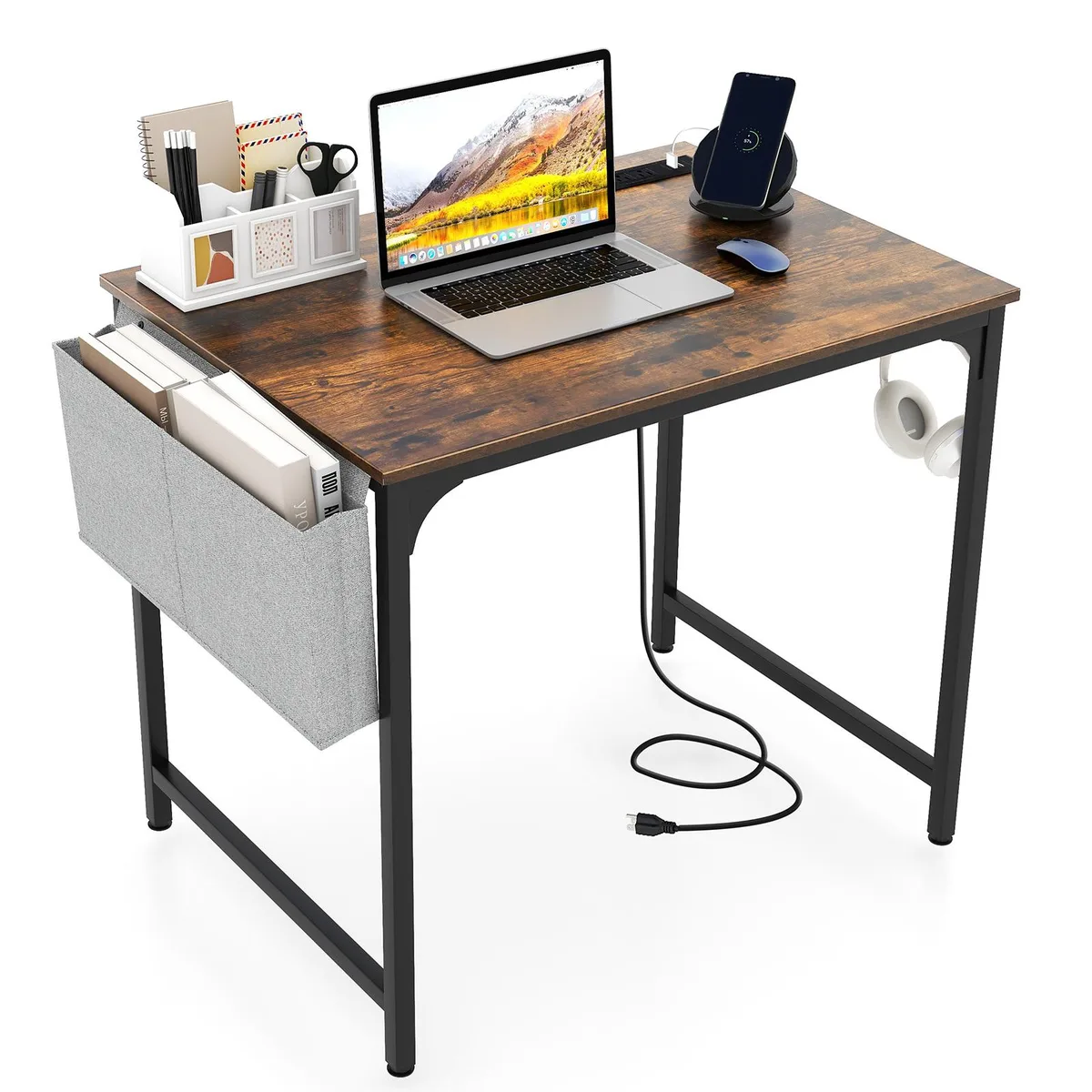 Rustic brown rectangular desk with black metal frame, built-in power strip and fabric storage bag hanging underneath
