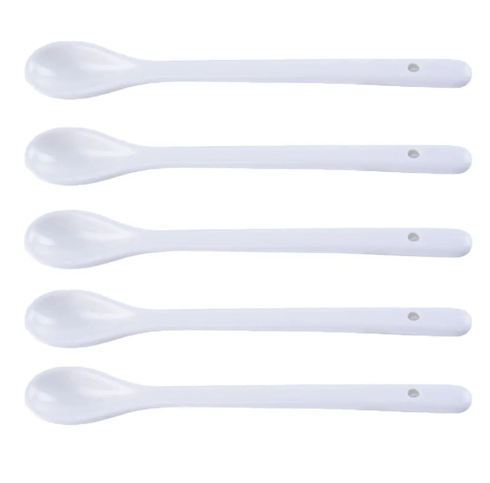Five white porcelain spoons, 6.7 inches long, smooth finish