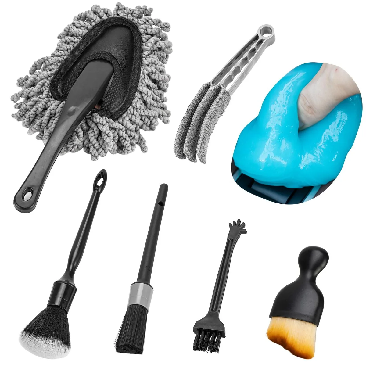 Rectangular kit box containing microfiber duster, detailing brushes, and cleaning gel