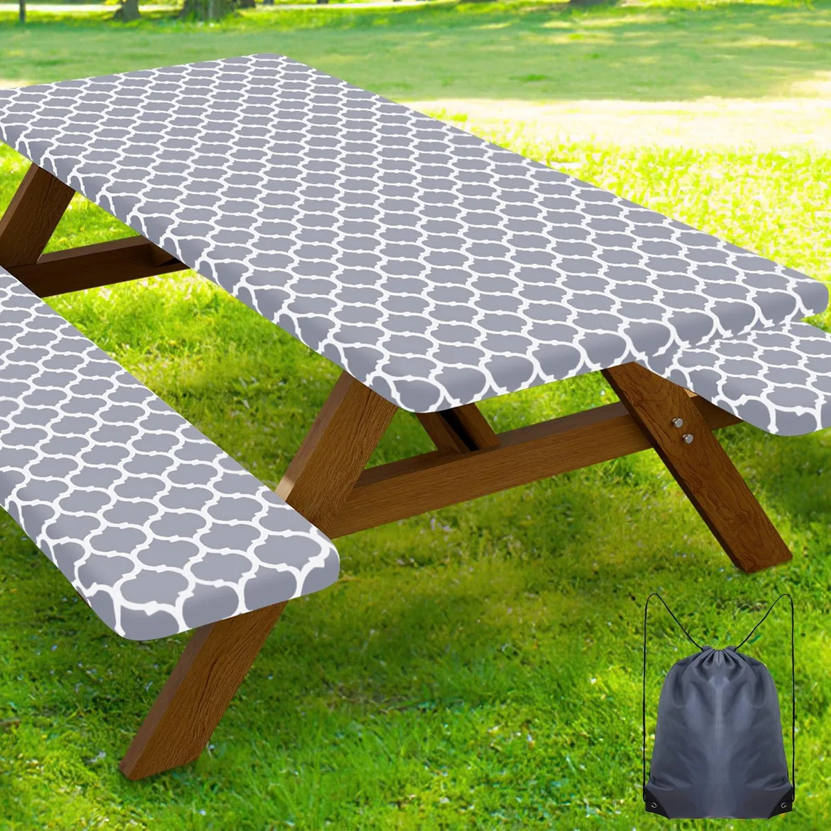 Grey fitted picnic table cover set with two matching bench covers and drawstring storage bag