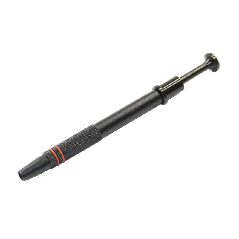 Black aluminium-alloy IC extractor with four steel-wire claws, 12 cm long
