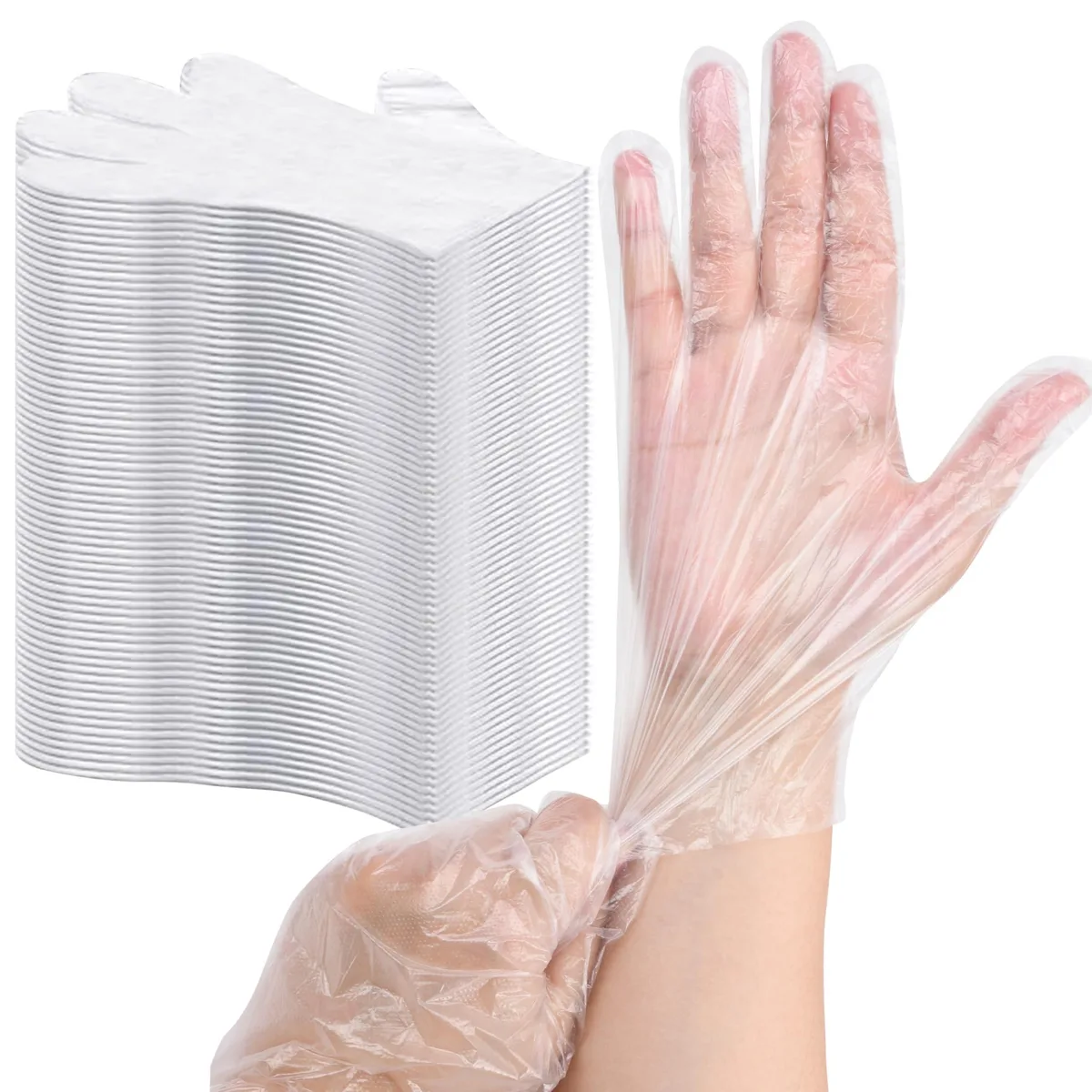 Box containing 1200 clear disposable plastic gloves in 12 packs of 100