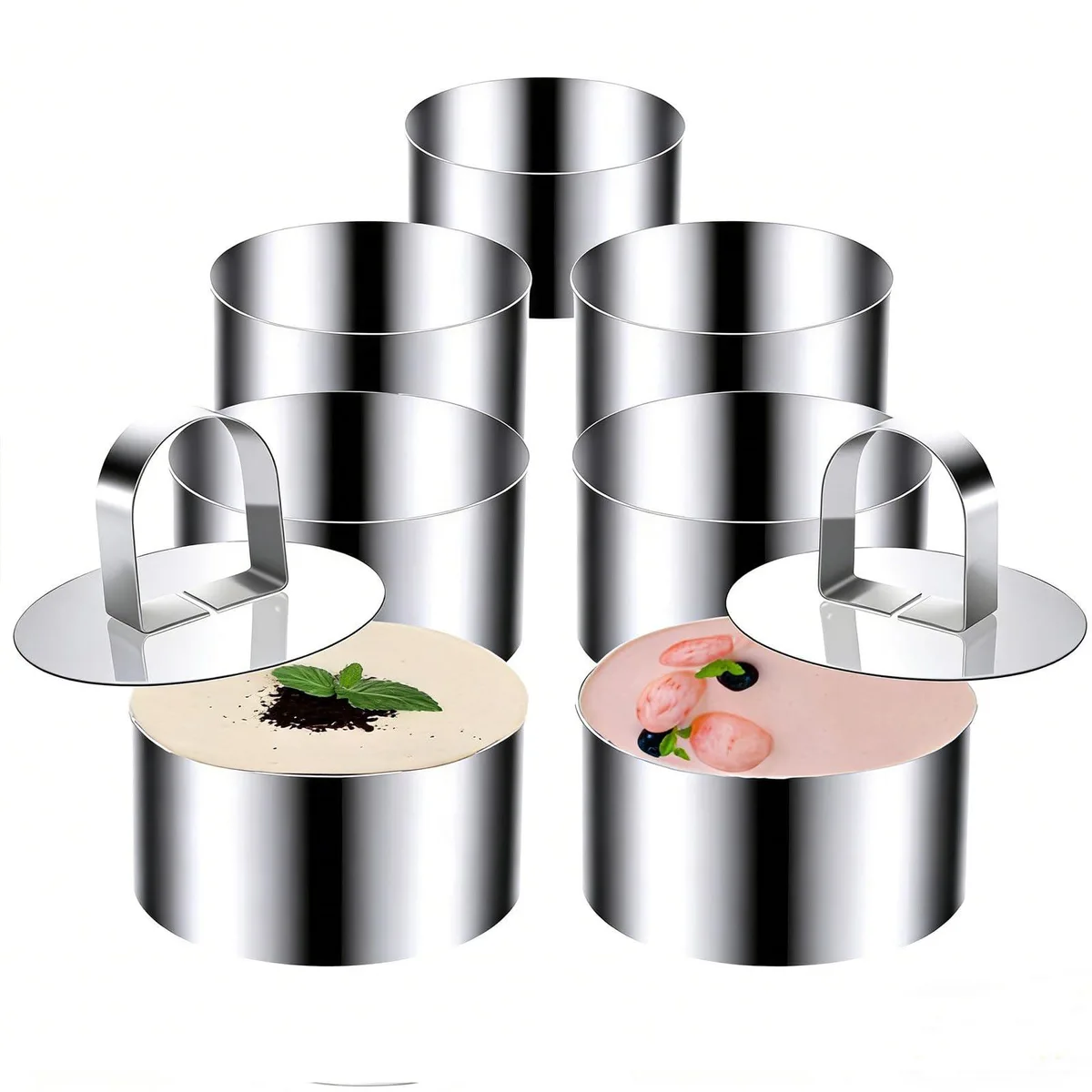 Six stainless steel cake rings, 3.15 inch diameter, with two matching pushers