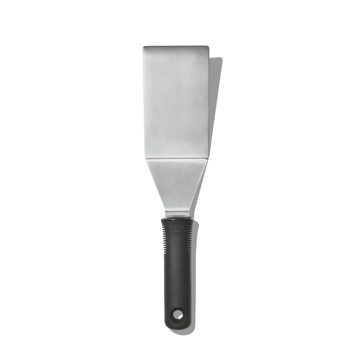 Black stainless steel turner with silver handle, 1½ inch wide head, beveled flexible blade, tapered non-slip grip
