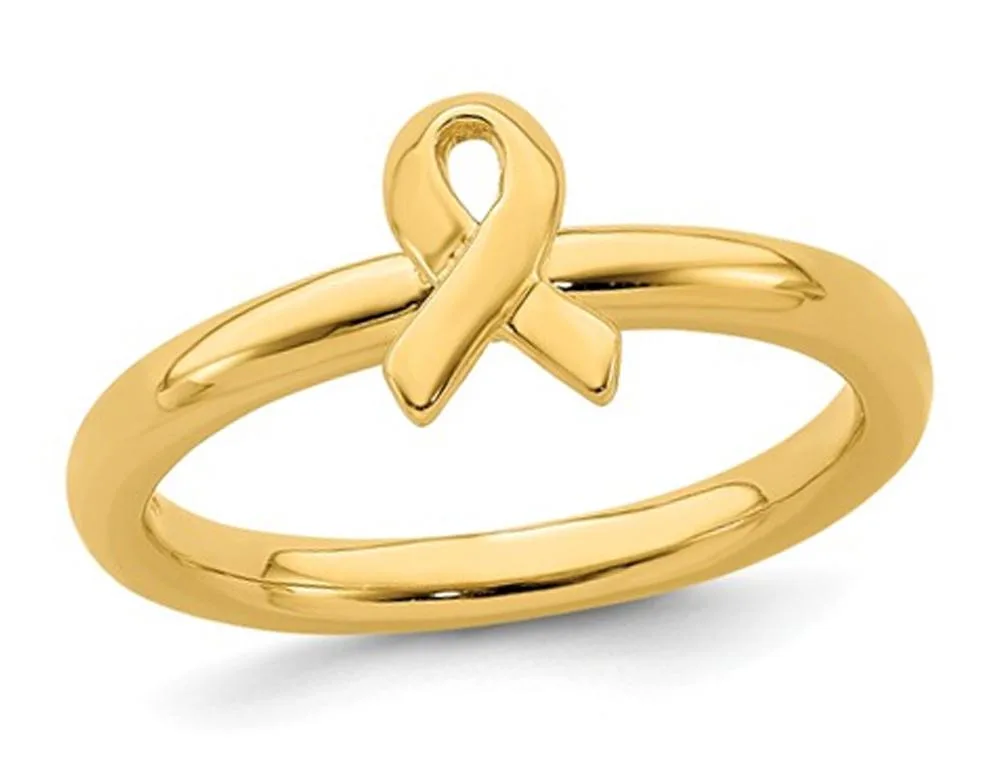 A yellow gold plated sterling silver ring featuring an awareness ribbon design