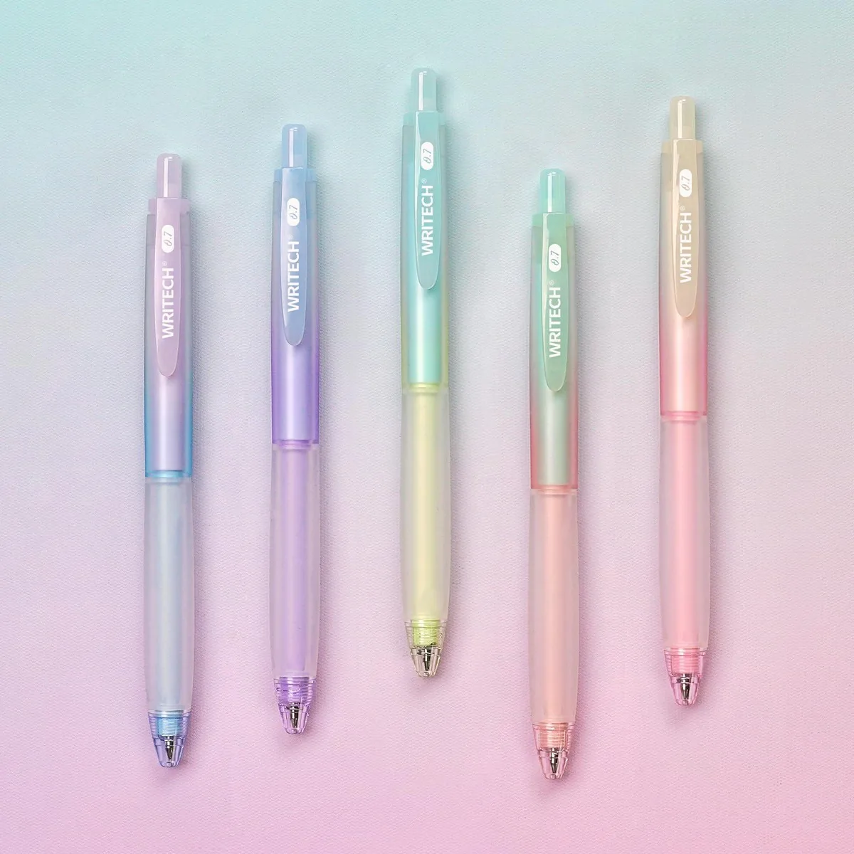 Five retractable gel pens with gradient barrels, silicone grips, and five black ink refills