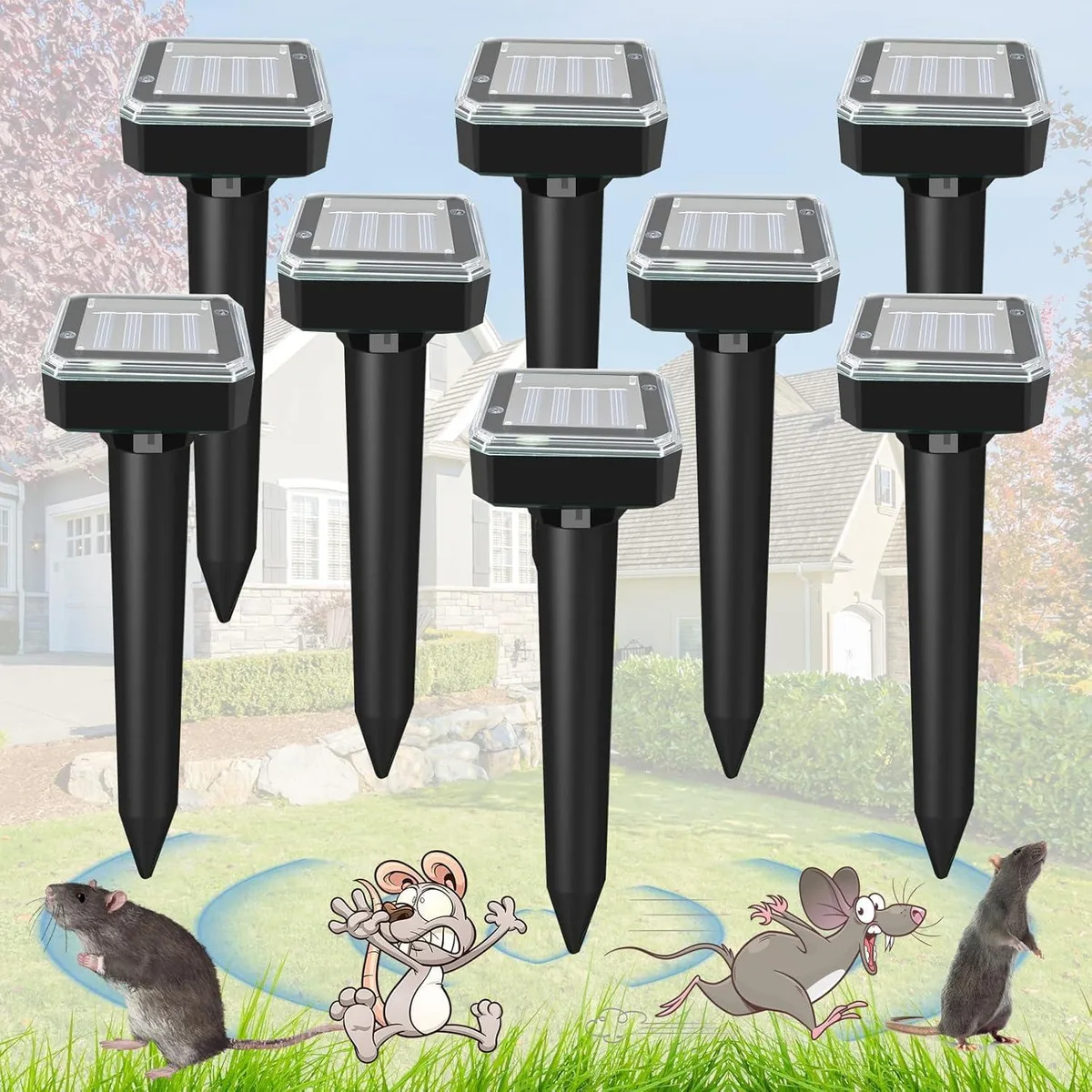 Eight green plastic stakes with solar panels on top
