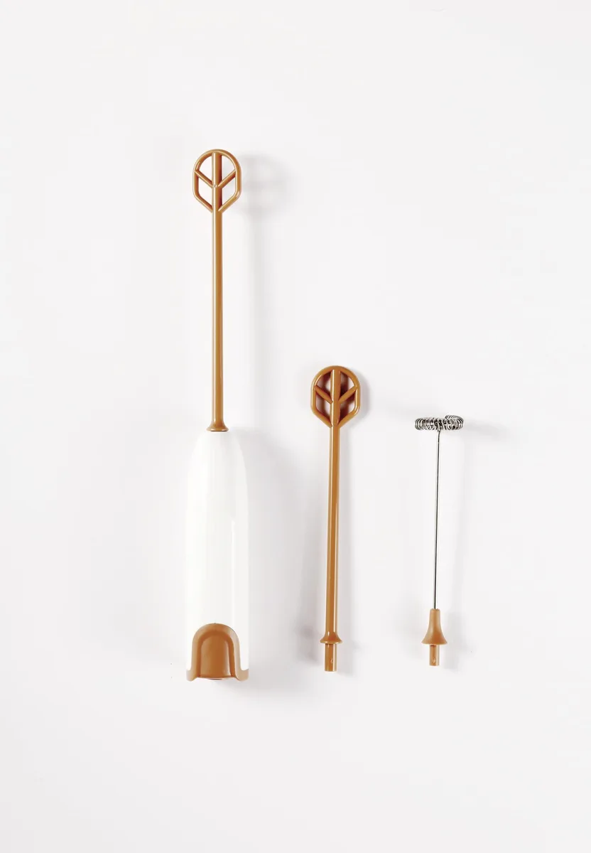 Off-white handheld electric baby formula mixer with mixing wand