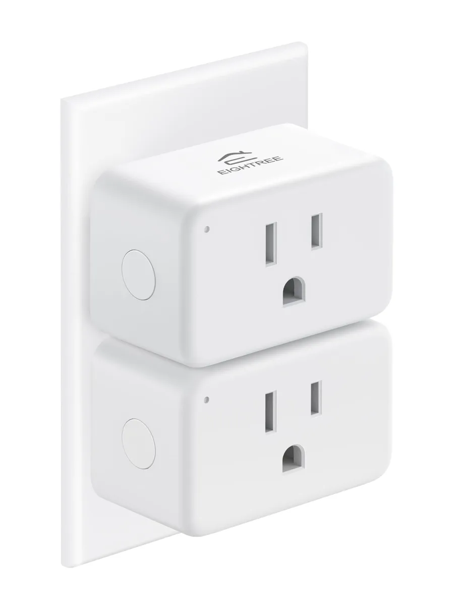 Two compact white smart plugs side by side