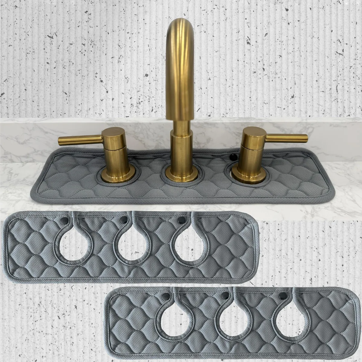 Gray absorbent splash guard mat with three round holes for faucet