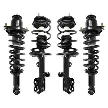 Four silver strut assemblies with coil springs and mounts