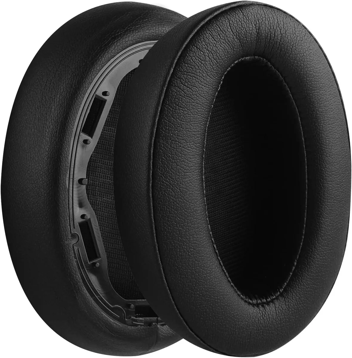 Pair of black oval ear pads in protein leather with memory foam, shown flat