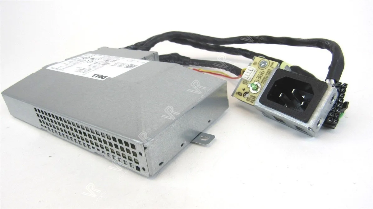 A rectangular black metal power supply unit with side ventilation slots and a rear IEC power socket