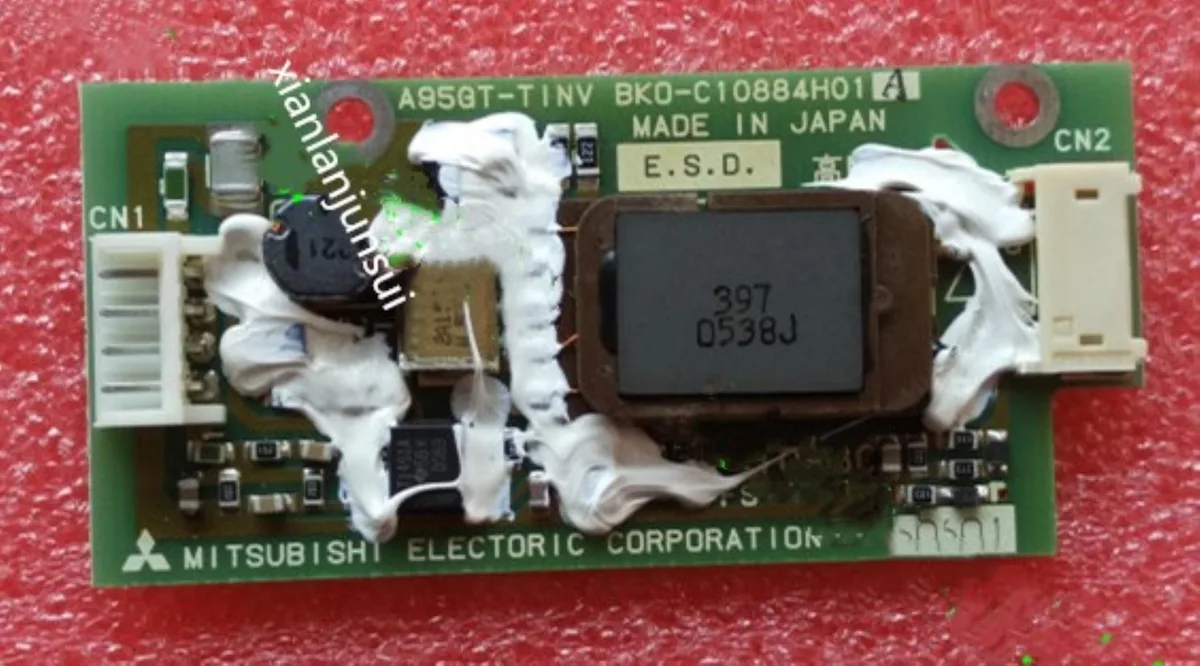 Flat ribbon cable with multiple connectors on dark background
