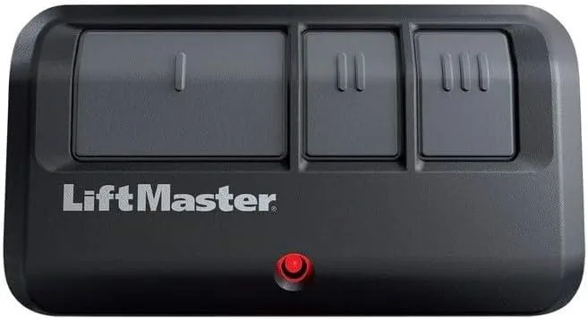 Small rectangular black remote with visor clip and single button