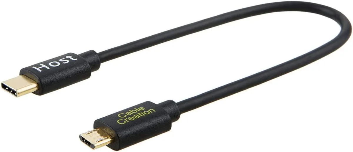 Short black USB-C to Micro-USB OTG cable, 0.65 ft, straight connectors