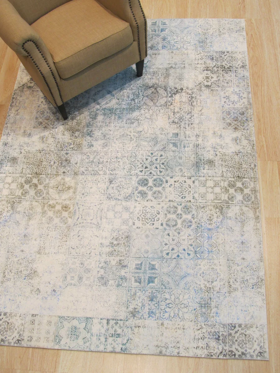 Green distressed Bohemian mosaic area rug, low-shedding polyester pile, allover abstract pattern